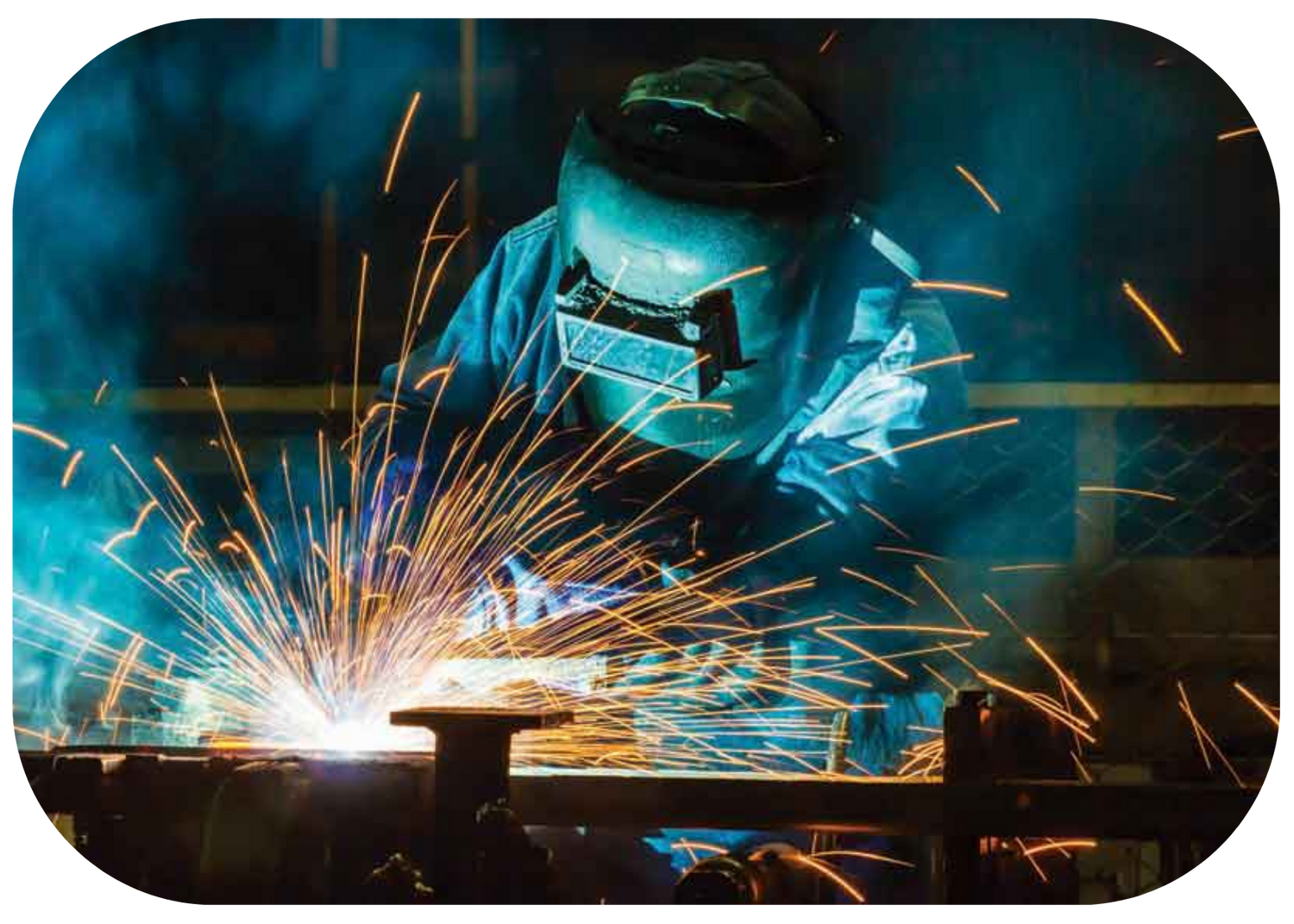 a man welding with sparks